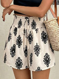 Smocked Drawstring Print Ruffled Shorts - by Hidden Brand